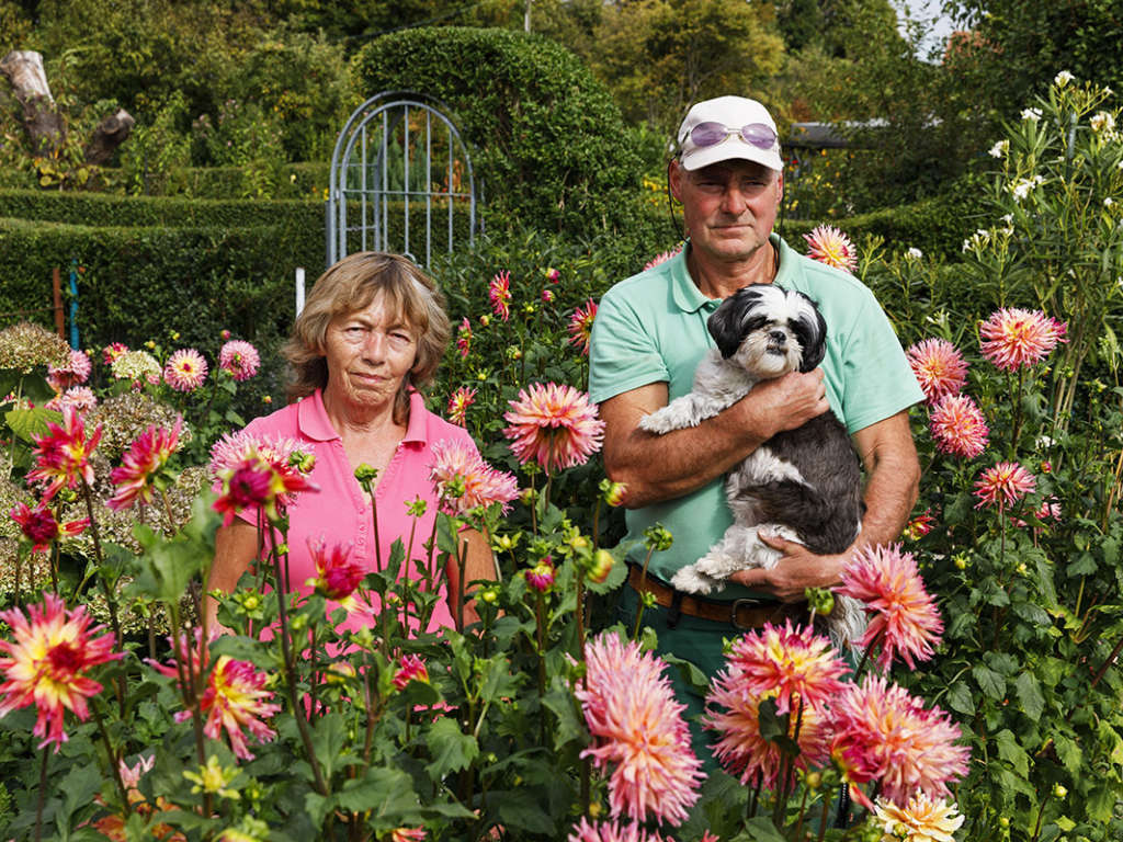 Martin Parr: GERMANY. Dusseldorf. KGV Am Schwarzen Weg. Ursula and Wolfgang Opitz with dog Lina. 2018 © Martin Parr / Magnum Photos